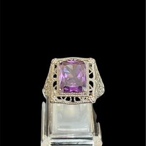 Elegant Silver and Purple Gemstone Ring